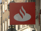[New logo: white flames on a red background]